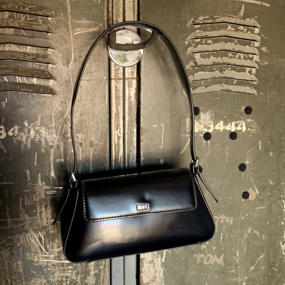 DKNY patent leather clutch.